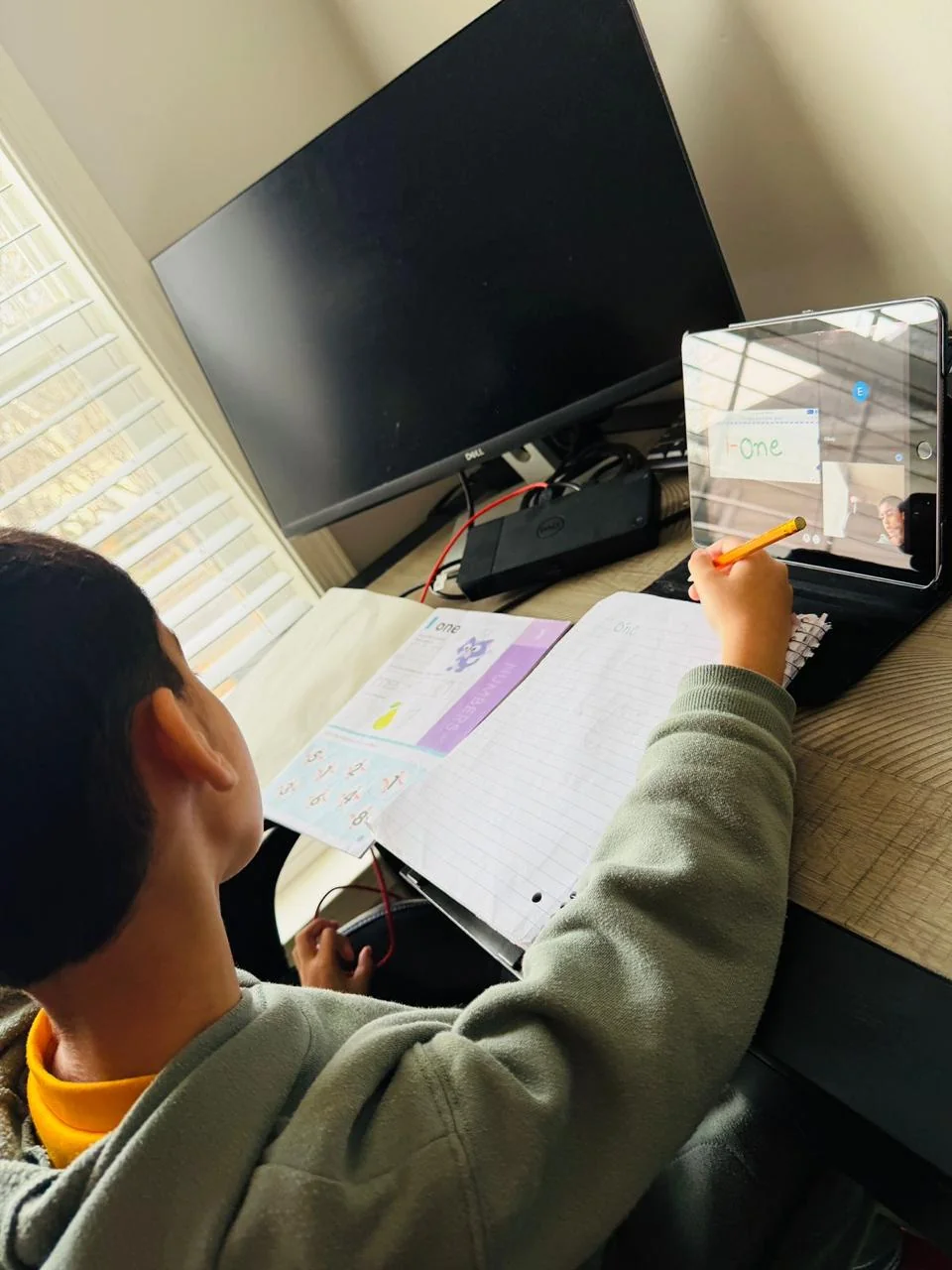 online 1-to-1 tutoring subjects for kids with live teacher helping student complete homework at home